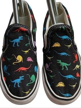 Vans Kids Black Slip-On Sneakers with Multicolor Dinosaur Print